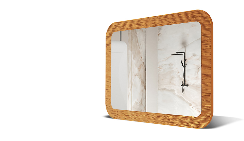 Mirror in a frame with metal decoration. A symbol of modern elegance